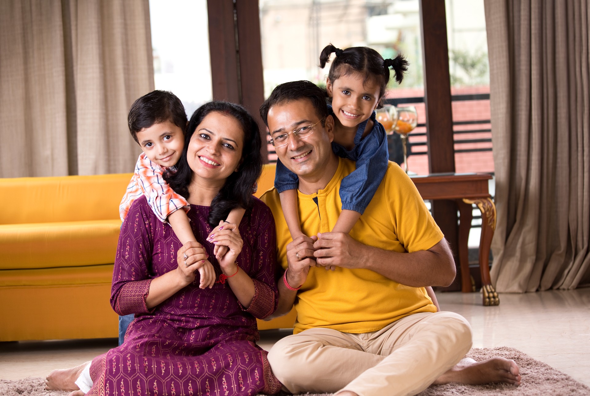 Happy Indian family at home